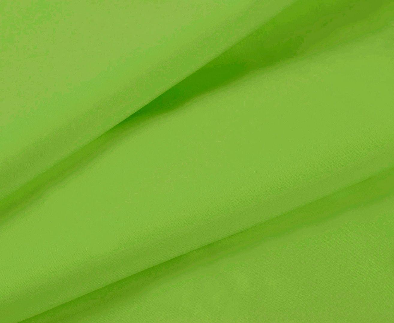 Green bed sheet fabric close-up with subtle weave texture