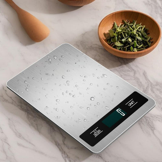 Stainless steel ultra-thin digital kitchen scale with wet droplets on top surface