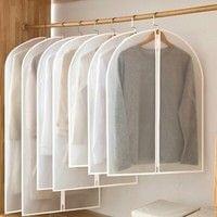 Set of clear hanging garment storage bags on a clothing rack