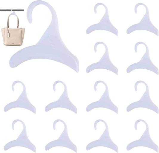 Set of white clothes hangers with curved hooks, arranged as a 12-pack