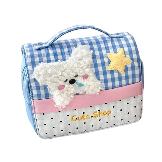 Blue gingham fluffy puppy makeup bag with star patch, pink trim, and zip closure