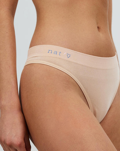 Bone cheeky G-string underwear with thin sides and elastic waistband