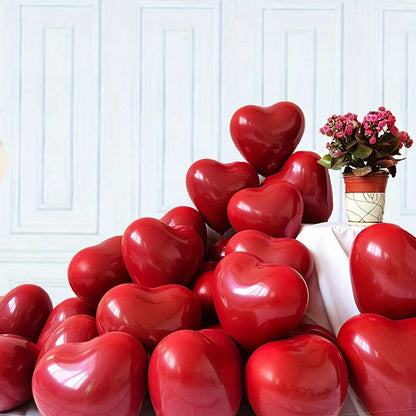 Red glossy heart balloon bundle piled together