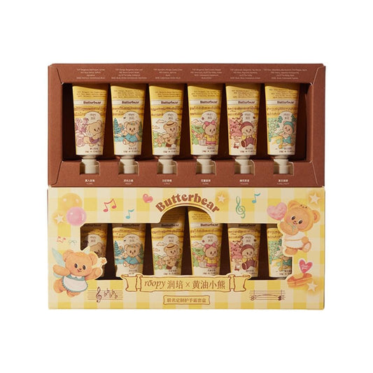 Mini hand cream set with six illustrated tubes in a brown display box