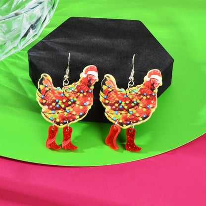 Pair of Santa acrylic dangle earrings with red hat and multicolor light speckles