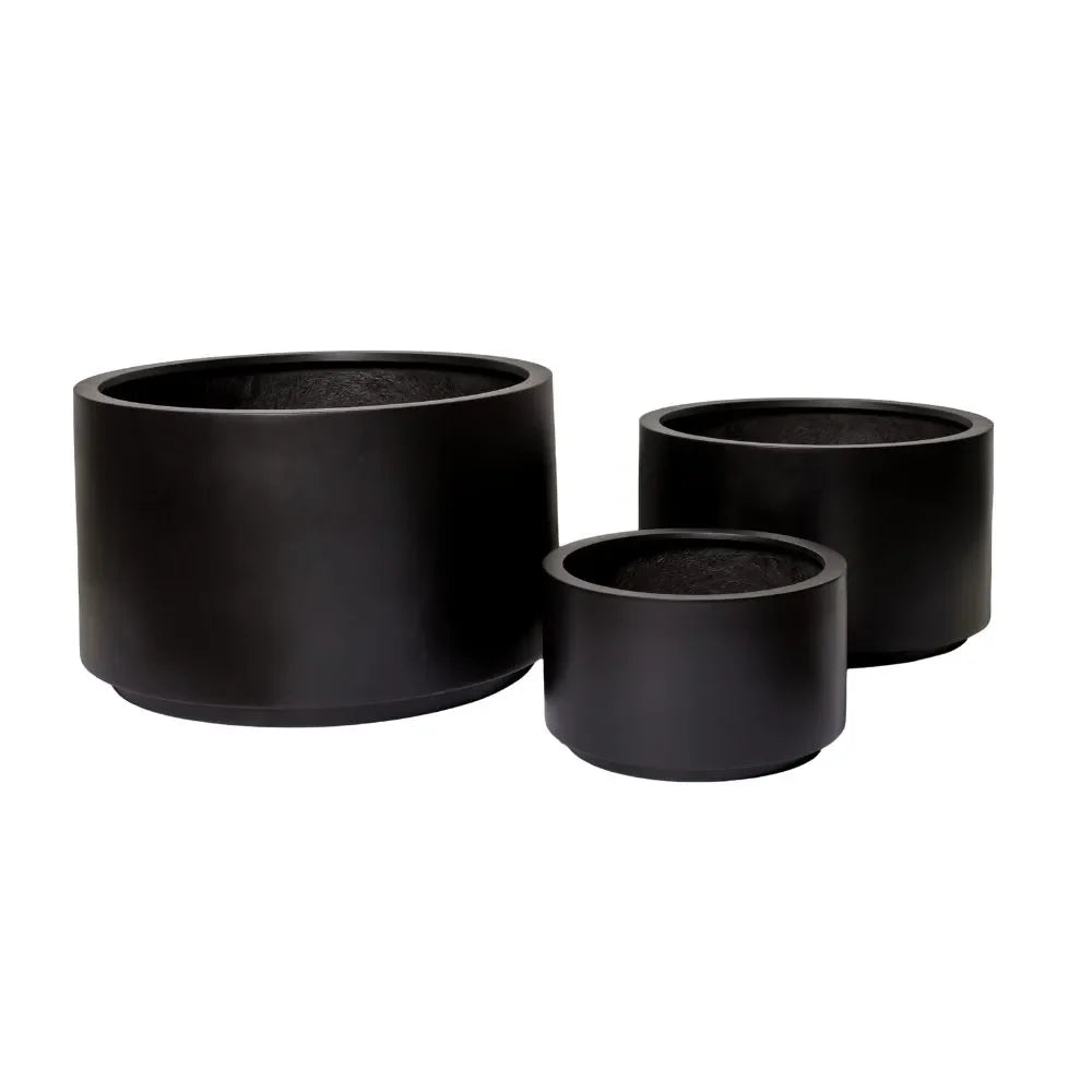 Dark plant pot set with three cylindrical planters for indoor plants
