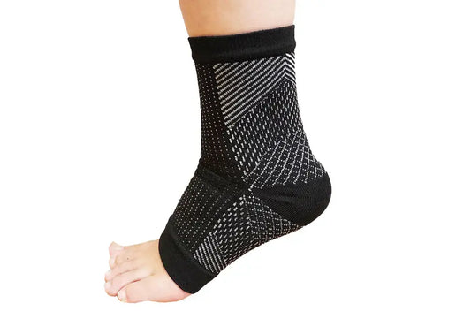 Black ankle sleeve with patterned compression band around heel and arch