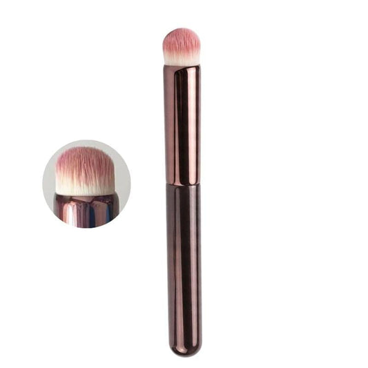 Lip blending brush with round head and soft pink bristles, rose-gold handle.