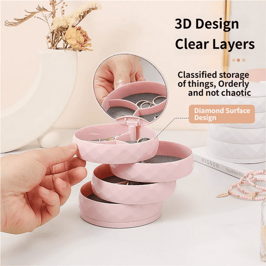 Pink rotating 4-tier jewelry organizer with clear layers and circular mirror