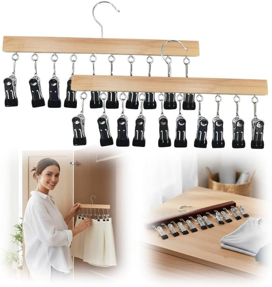Wooden legging hanger bar with multiple black non-slip clips, metal hooks