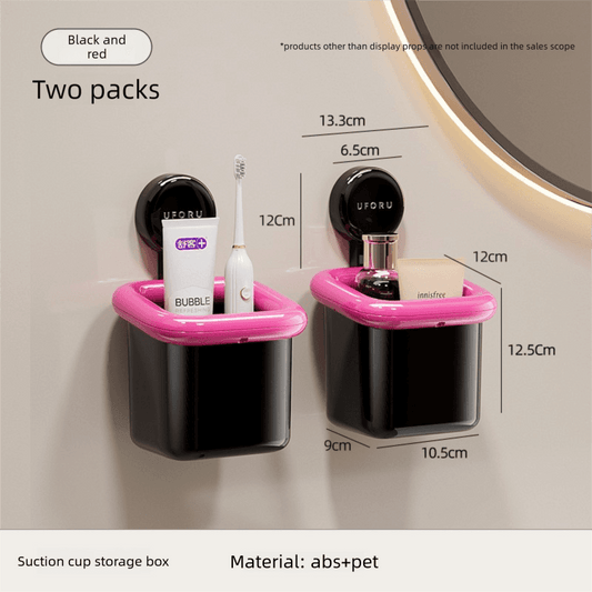 Two-pack suction cup toothbrush holders, black and pink with open cups and drainage base