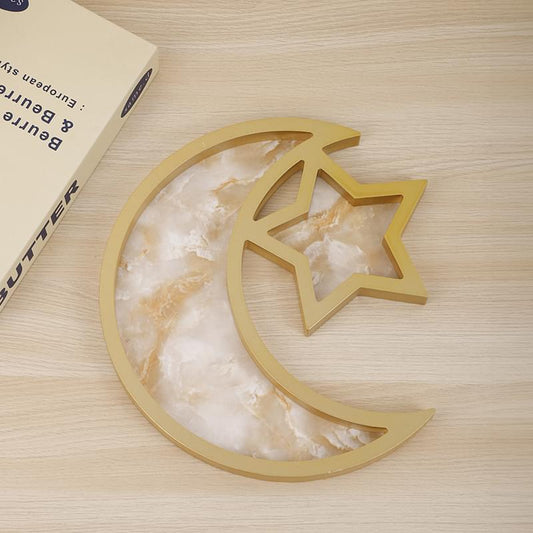 Gold moon serving tray with marble-effect inlay and star cutout centerpiece