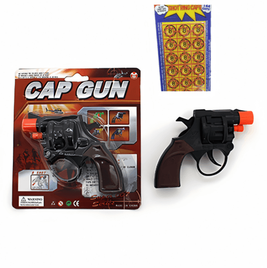Mini cap gun toy with orange barrel and black grip, shown in retail packaging