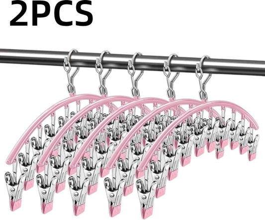 Two-piece pink clothes rack set with metal clips on a hanging bar