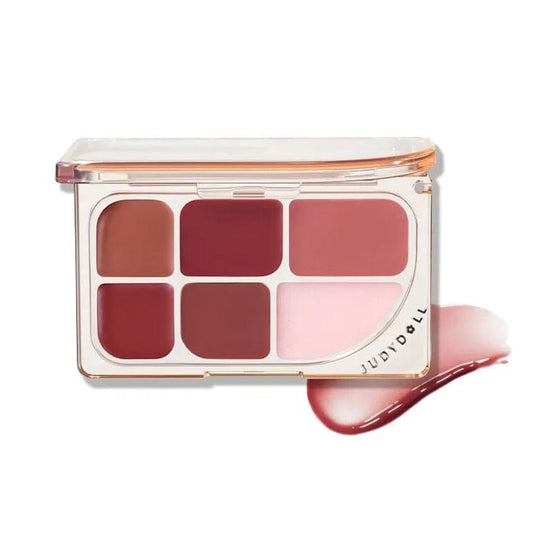 JUDYDOLL 6-pan lip palette with nude, rose, and berry-toned shades in clear case