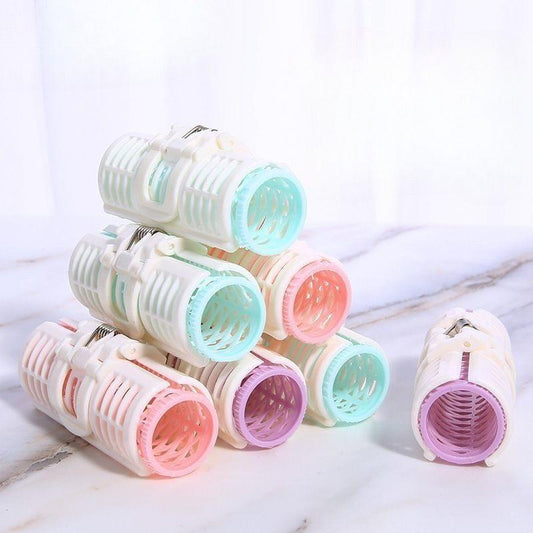 Small hair curler set with pastel mint, pink, lavender, and coral rollers