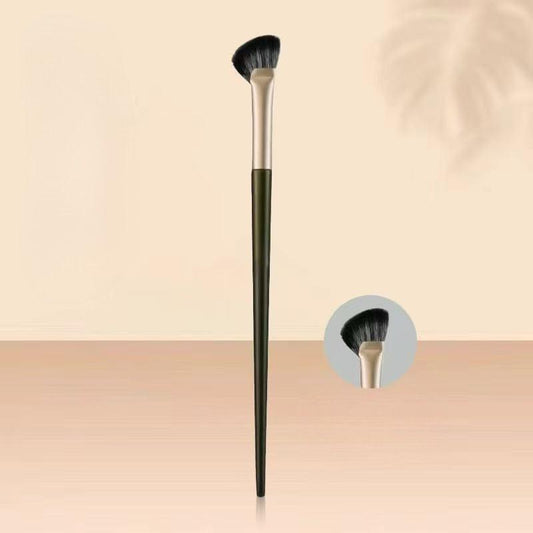Fan nose shadow brush with green handle and black bristles, shown end-on.