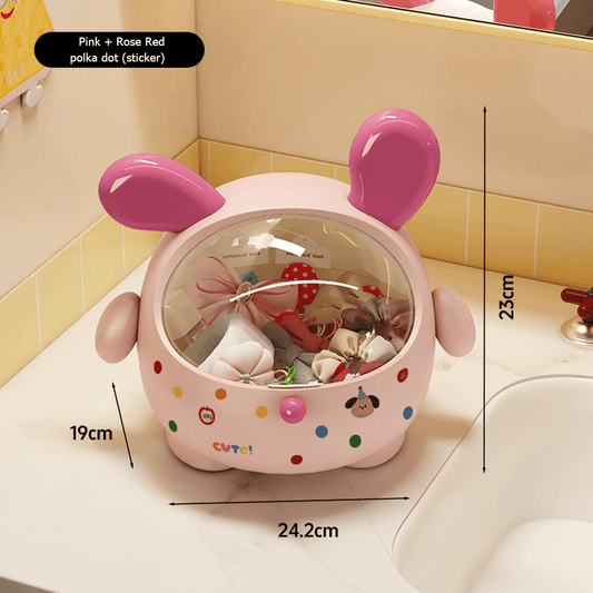 Pink and red dog-shaped mini desktop bin with polka-dot style sticker and open lid