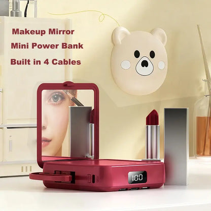 Rosy red makeup mirror power bank with pet cartoon face, mirror open, built-in cable ports