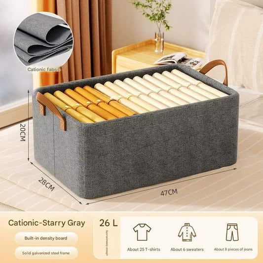 Grey fabric storage bin with steel frame, open top, tan handle grips