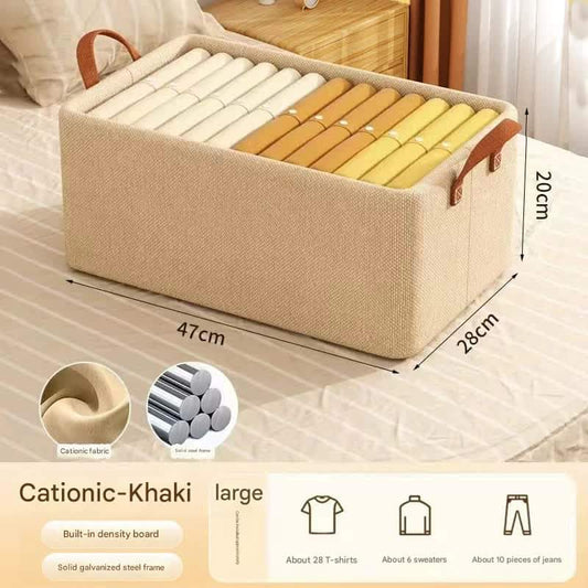 Khaki foldable fabric storage bin with tan handles, open top compartment