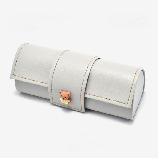 White PU leather glasses case with beige stitching and bear charm
