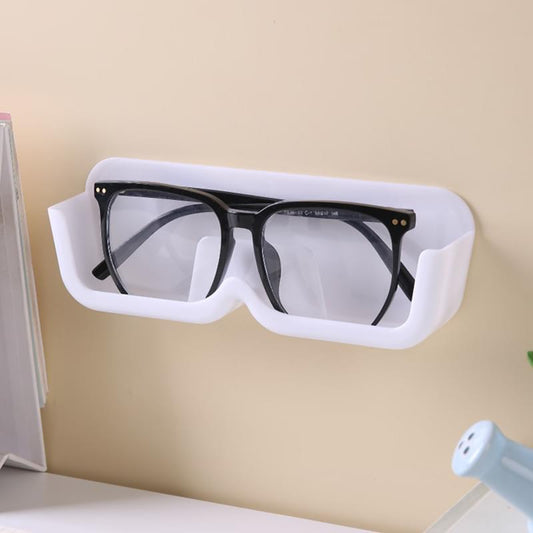 White wall-mounted glasses organizer with two open slots for eyewear storage