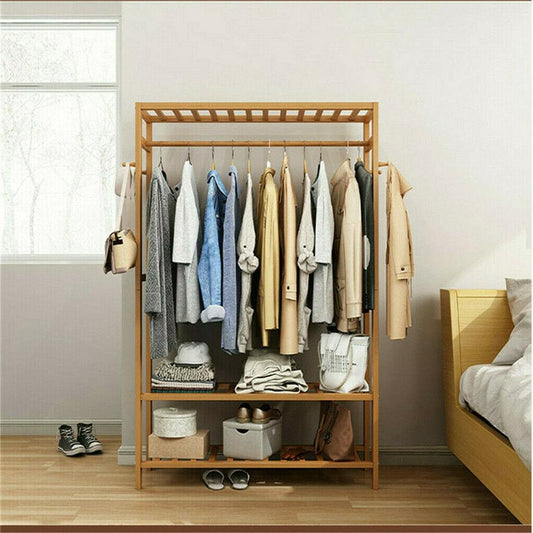 3-tier wooden garment rack with hanging bar, side hooks, and lower shelves for storage