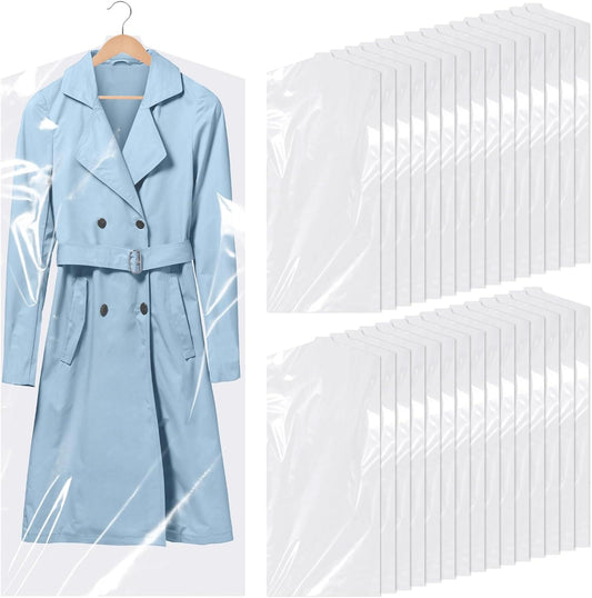 Clear garment bag with a light blue coat on a hanger, multiple bags shown