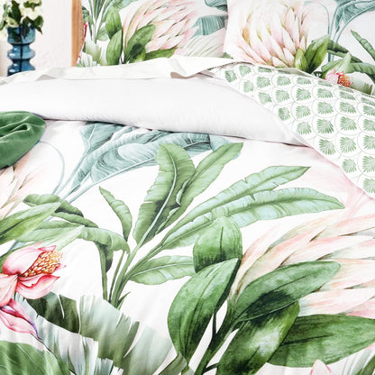 Kids quilt cover set close-up: large green and pink tropical foliage on white