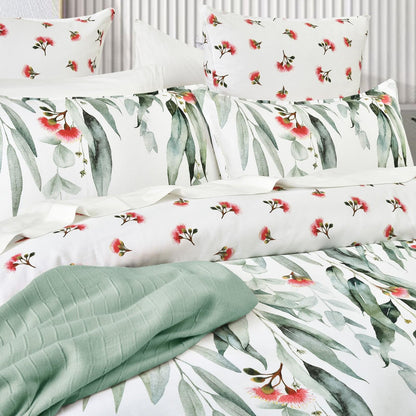 Kids quilt cover set close-up, mint reversible fabric with green eucalyptus leaf print