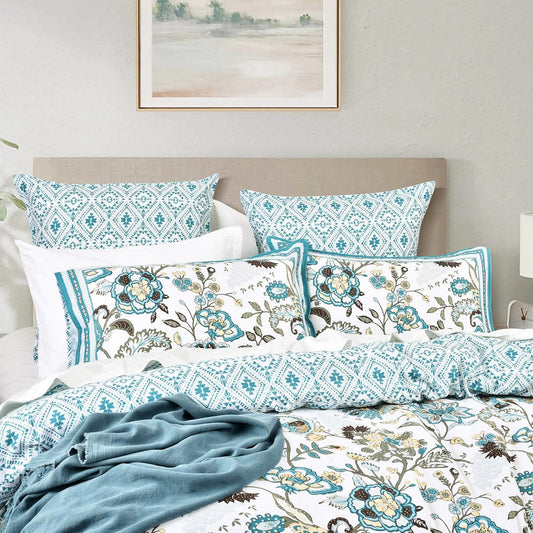 Reversible kids quilt cover set with blue diamond pattern and white floral print pillowcases