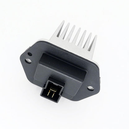 Heater fan resistor module with black housing, silver fins, and two-pin connector