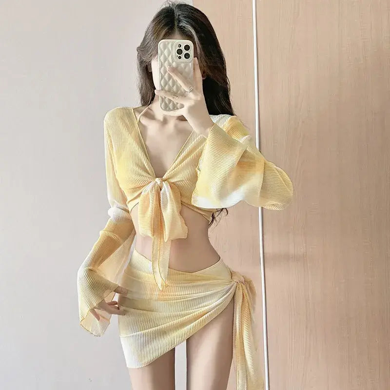 Yellow ribbed two-piece swimsuit set with tie-front sheer cover-up top and wrap mini skirt