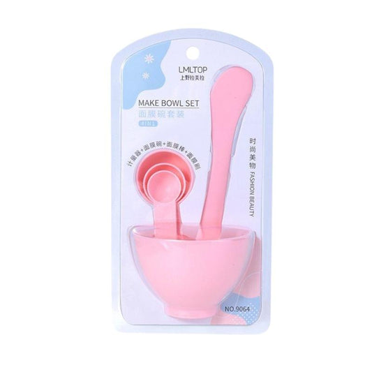 DIY facial mask bowl set, pink bowl and applicator spoon in retail packaging