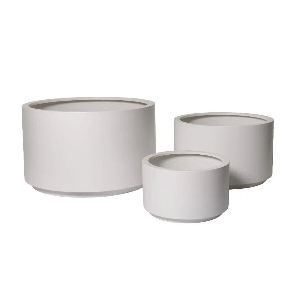 White plant pot set with three cylindrical planters in nested sizes