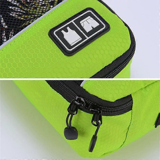 Mesh packing cube with lime green textured fabric, black zipper pull and label patch