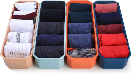 Four-compartment sock and underwear storage boxes, filled with folded socks