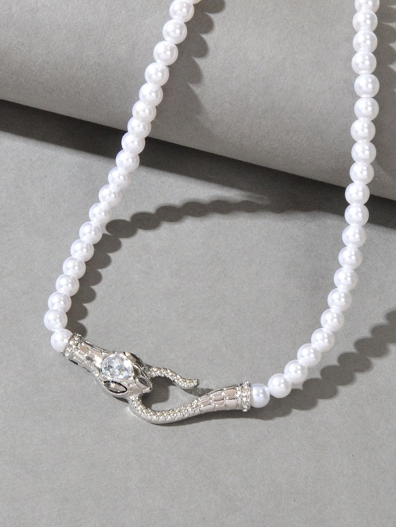 Double-row pearl bead choker necklace with silver-toned snake charm and crystal-like stones