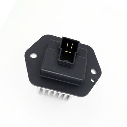 Heater fan resistor with black base, silver fins, and gold-pin connector socket