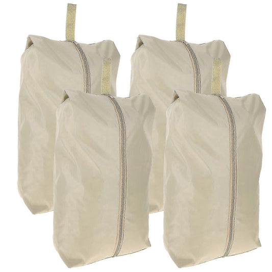 Set of 4 travel packing bags in light beige, each with zip closure and carry loop