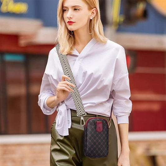 Chevron arrow jacquard ribbon trim worn as a crossbody strap, white and dark
