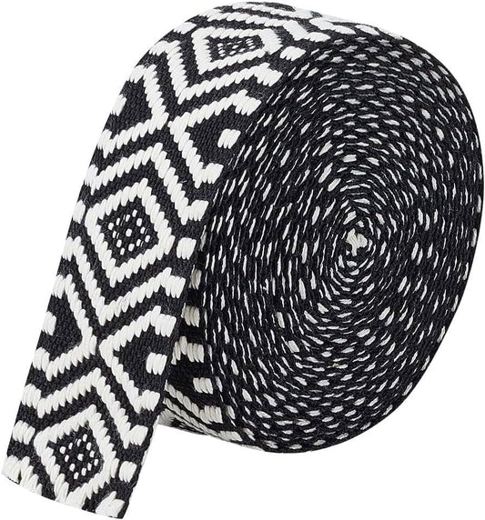 Jacquard arrow ribbon trim, black and white geometric pattern, rolled fabric