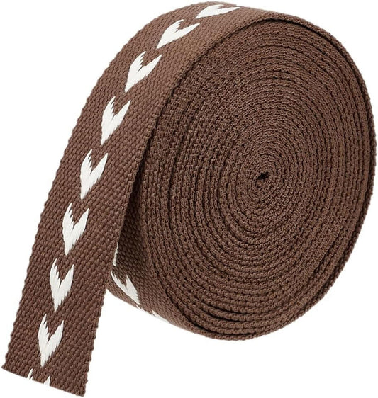 Brown jacquard arrow ribbon with white chevron pattern, rolled 38 mm spool