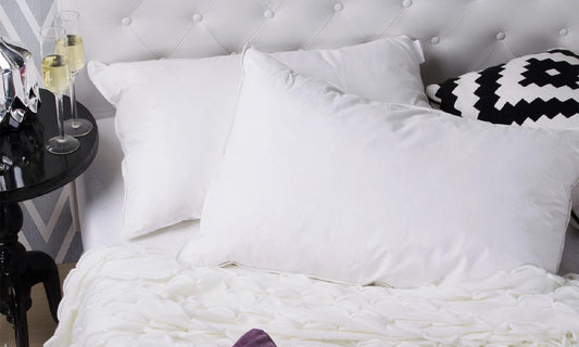 White duvet quilt and matching pillows with soft downy texture