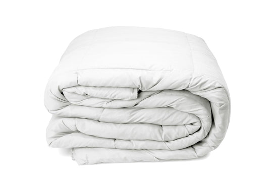 White duck down quilt, neatly folded and rolled with creased baffles