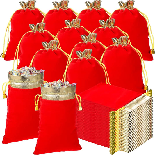 Red velvet drawstring jewelry pouch with gold-toned ribbon tie