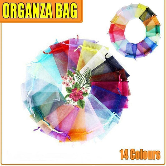 Assorted sheer organza drawstring bags in multiple colors, shown as a color ring