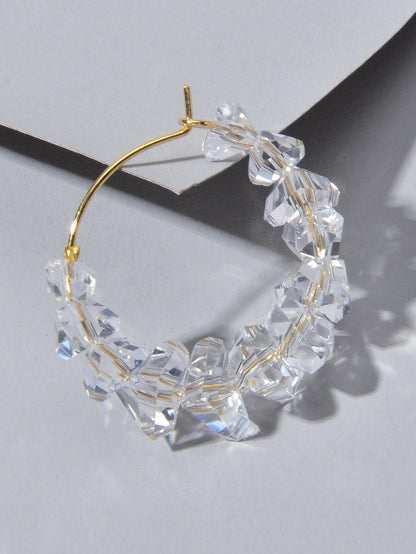 Gold-tone hoop dangle earrings with clear transparent acrylic bead chain