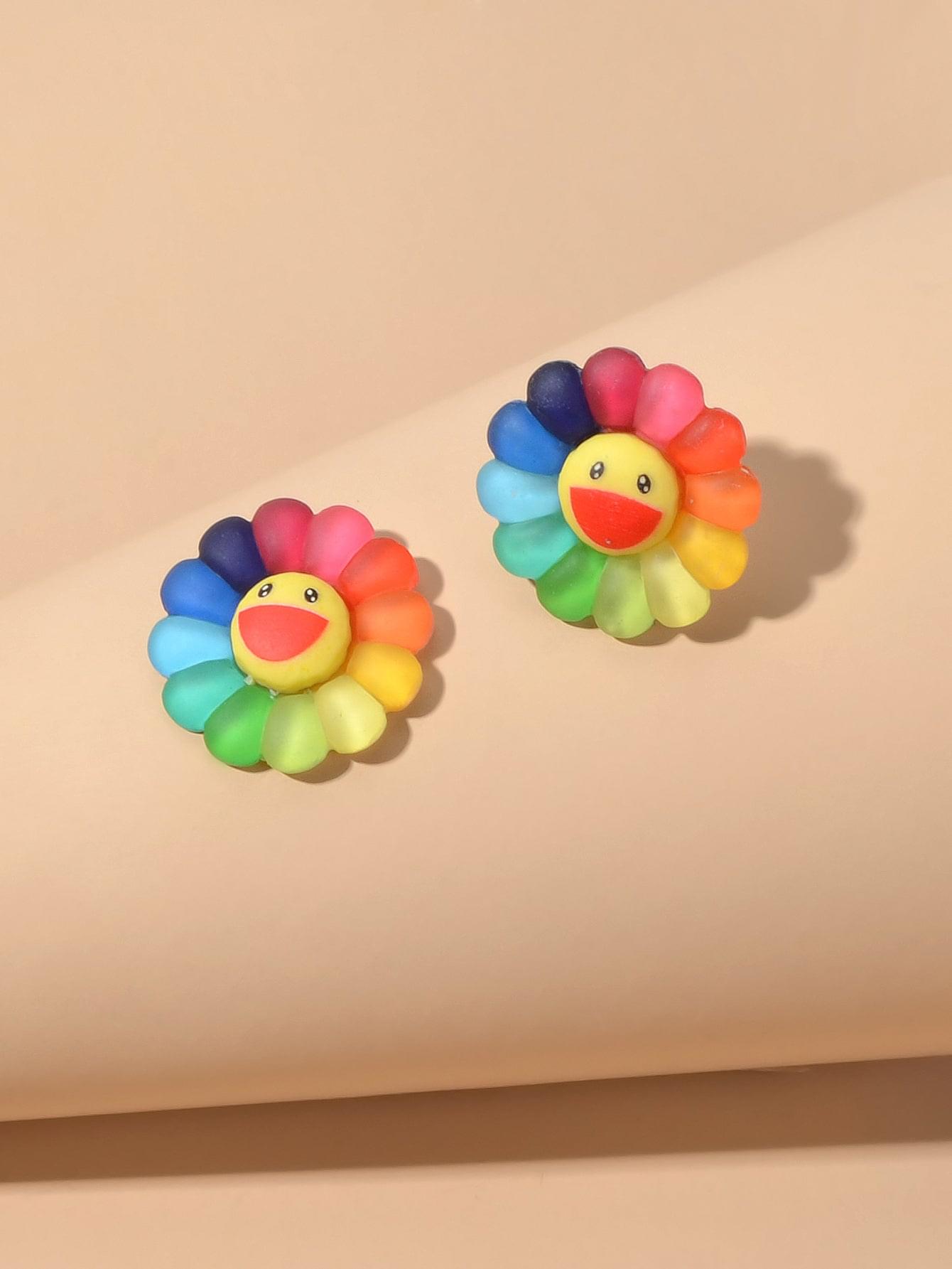 Pair of colorful flower smile face stud earrings with multicolor petals and red face